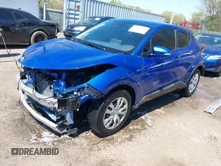 2020 Toyota C-HR LE with VIN JTNKHMBX7L1071287, listed as a IAAI auction lot 42063896 with 76,731 mi miles. Bid and sale history available at carsss.com. Image 18.