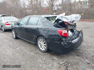 2013 Toyota Camry Hybrid LE with VIN 4T1BD1FK5DU089991, listed as a IAAI auction lot 41953719 with 222,713 mi miles. Bid and sale history available at carsss.com. Image 3.