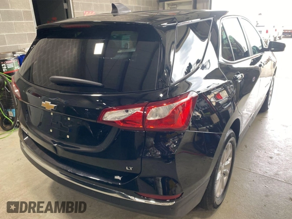 2021 Chevrolet Equinox LT z VIN 3GNAXJEV2ML379402, wystawiony jako IAAI lot #42504649 z przebiegiem 58 647 mil mil oraz . Historia ofert i sprzedaży dostępna na DreamBid. Obrazek 2.