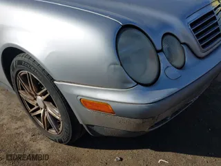 1999 Mercedes-Benz CLK-Class with VIN WDBLK65G6XT006151, listed as a IAAI auction lot 41597025 with 230,751 mi miles. Bid and sale history available at carsss.com. Image 6.
