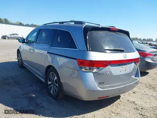 2016 Honda Odyssey Touring Elite with VIN 5FNRL5H91GB158499, listed as a IAAI auction lot 41899037 with 119,364 mi miles. Bid and sale history available at carsss.com. Image 3.
