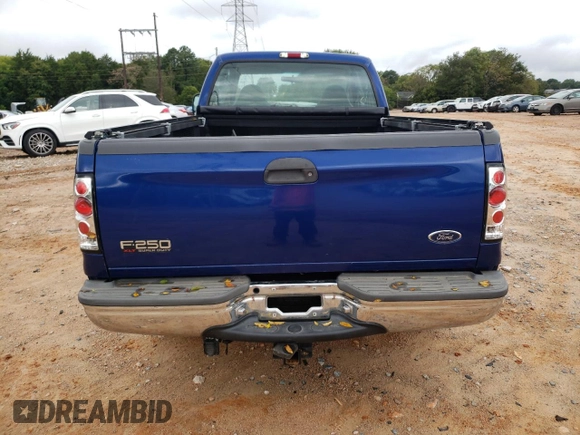 1999 Ford F-250 XL with VIN 1FTNX20L8XEB15501, listed as a Copart auction lot 70181124 with 125,476 mi miles and Salvage title. Bid and sale history available at DreamBid. Image 6.