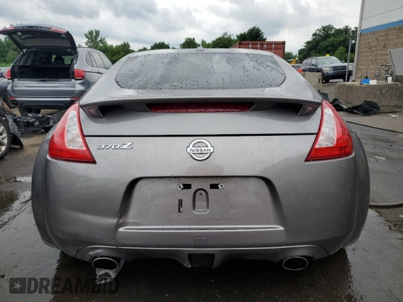 2009 Nissan 370Z Touring with VIN JN1AZ44E69M404789, listed as a Copart auction lot 62015094 with 56,447 mi miles and Salvage Title. Bid and sale history available at carsss.com. Image 6.