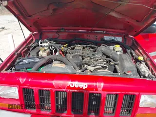 2001 Jeep Cherokee Sport z VIN 1J4FT48S01L508039, wystawiony jako IAAI lot #42743009 z przebiegiem 200 074 mil mil oraz . Historia ofert i sprzedaży dostępna na DreamBid. Obrazek 10.