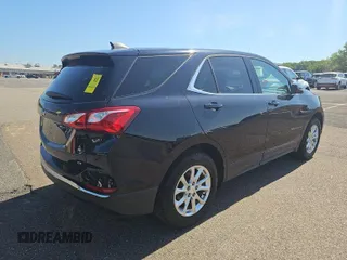 2020 Chevrolet Equinox LT with VIN 2GNAXJEVXL6233574, listed as a IAAI auction lot 42573162 with 58,591 mi miles and . Bid and sale history available at DreamBid. Image 4.