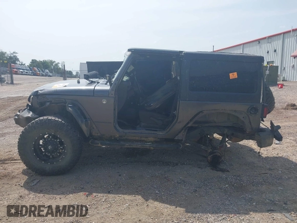2014 Jeep Wrangler Sport with VIN 1C4AJWAGXEL233647, listed as a IAAI auction lot 39993785 with Not Provided miles and . Bid and sale history available at DreamBid. Image 15.