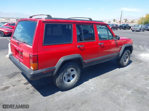 1995 Jeep Cherokee Sport with VIN 1J4FJ68SXSL572608, listed as a IAAI auction lot 42023846 with 167,342 mi miles. Bid and sale history available at carsss.com. Image 4.