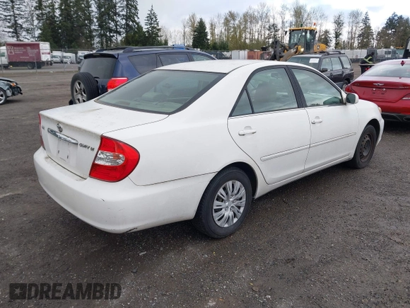 2004 Toyota Camry LE with VIN JTDBE32K840256161, listed as a IAAI auction lot 42000050 with 367,016 mi miles. Bid and sale history available at carsss.com. Image 4.