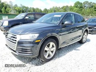 2018 Audi Q5 Premium z VIN WA1ANAFY5J2052748, wystawiony jako Copart lot #61084845 z przebiegiem 117 881 mil mil oraz Czysty tytuł • Clean title. Historia ofert i sprzedaży dostępna na DreamBid. Obrazek 1.