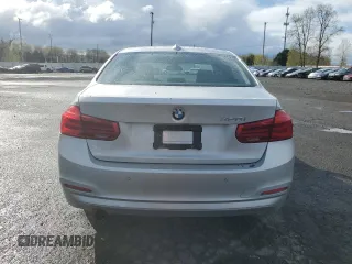 2018 BMW 3 Series 320i with VIN WBA8A9C57JAD27972, listed as a Copart auction lot 51279135 with 64,444 mi miles and Salvage title. Bid and sale history available at DreamBid. Image 6.
