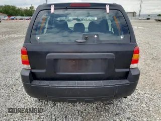 2005 Ford Escape XLS Value with VIN 1FMYU92Z95DA22100, listed as a Copart auction lot 57874705 with 192,057 mi miles and Salvage title. Bid and sale history available at DreamBid. Image 6.
