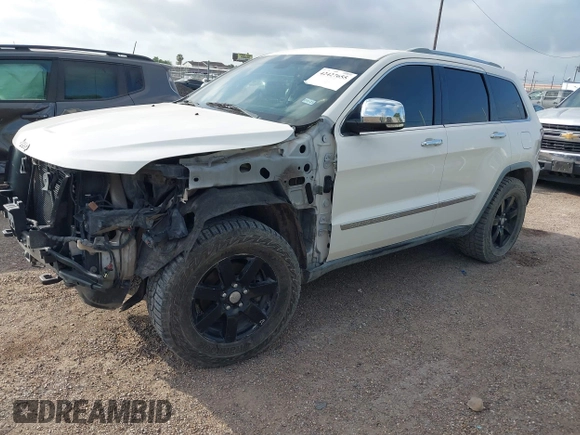 2011 Jeep Grand Cherokee Overland Summit with VIN 1J4RR6GT9BC586712, listed as a IAAI auction lot 42427655 with 157,549 mi miles and . Bid and sale history available at DreamBid. Image 18.