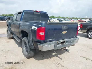 2008 Chevrolet Silverado 1500 LTZ with VIN 2GCEK133881111214, listed as a IAAI auction lot 41986926 with 215,979 mi miles. Bid and sale history available at carsss.com. Image 3.