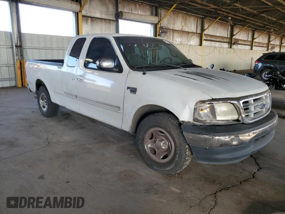 2000 Ford F-150 XL with VIN 1FTRX17W1YNB88948, listed as a Copart auction lot 83114404 with 288,100 mi miles and Salvage Title. Bid and sale history available at carsss.com. Image 4.