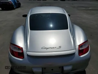 2007 Porsche Cayman S с VIN WP0AB29837U780257, выставлен на аукционе Copart как лот 68733494 с пробегом 164 227 миль миль и Списание • Salvage title. История ставок и продаж доступна на DreamBid. Изображение 6.