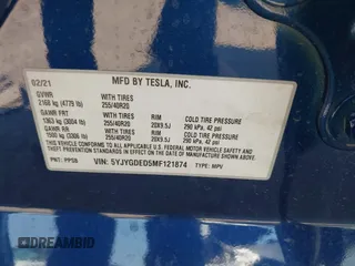 2021 Tesla Model Y Standard Range with VIN 5YJYGDED5MF121874, listed as a IAAI auction lot 41238170 with 72,041 mi miles and . Bid and sale history available at DreamBid. Image 9.