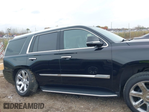 2019 Cadillac Escalade Luxury z VIN 1GYS4BKJ1KR398505, wystawiony jako IAAI lot #40662422 z przebiegiem 57 932 mil mil oraz . Historia ofert i sprzedaży dostępna na DreamBid. Obrazek 13.