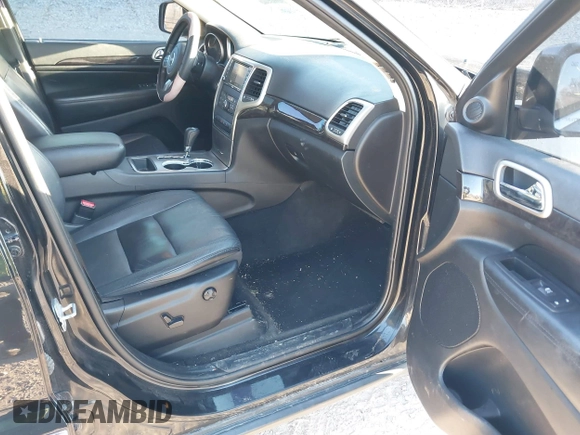 2012 Jeep Grand Cherokee Laredo with VIN 1C4RJFAG3CC246577, listed as a IAAI auction lot 41807693 with 164,574 mi miles. Bid and sale history available at carsss.com. Image 5.