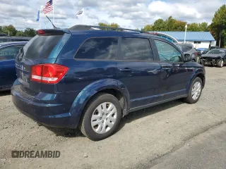 2014 Dodge Journey American Value Pkg with VIN 3C4PDCAB4ET141734, listed as a Copart auction lot 73952994 with 168,801 mi miles and Clean Title. Bid and sale history available at carsss.com. Image 3.