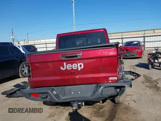 2021 Jeep Gladiator Overland z VIN 1C6HJTFGXML595781, wystawiony jako IAAI lot #41667696 z przebiegiem 31 438 mil mil oraz . Historia ofert i sprzedaży dostępna na DreamBid. Obrazek 16.