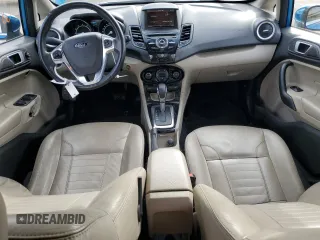 2015 Ford Fiesta Titanium z VIN 3FADP4FJ7FM120958, wystawiony jako Copart lot #85260204 z przebiegiem 144 587 mil mil oraz Szkoda całkowita • Salvage title. Historia ofert i sprzedaży dostępna na DreamBid. Obrazek 8.
