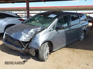 2012 Honda Odyssey EX-L with VIN 5FNRL5H6XCB103498, listed as a IAAI auction lot 42065658 with 104,933 mi miles and . Bid and sale history available at carsss.com. Image 17.