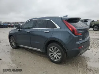 2020 Cadillac XT4 FWD Premium Luxury with VIN 1GYFZCR48LF043018, listed as a Copart auction lot 45097125 with 84,567 mi miles and Salvage Title. Bid and sale history available at carsss.com. Image 2.