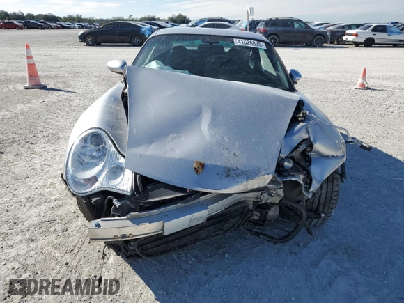 2004 Porsche 911 Carrera z VIN WP0AA29974S620854, wystawiony jako Copart lot #41626835 z przebiegiem 36 268 mil mil oraz Szkoda całkowita • Salvage title. Historia ofert i sprzedaży dostępna na DreamBid. Obrazek 5.