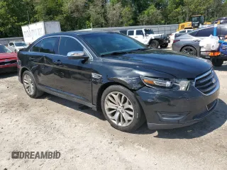 2015 Ford Taurus Limited z VIN 1FAHP2F82FG103711, wystawiony jako Copart lot #57158265 z przebiegiem 205 999 mil mil oraz Szkoda całkowita • Salvage title. Historia ofert i sprzedaży dostępna na DreamBid. Obrazek 4.