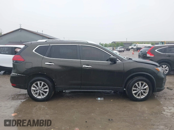 2017 Nissan Rogue SV with VIN KNMAT2MV1HP601384, listed as a IAAI auction lot 42454707 with 159,501 mi miles and . Bid and sale history available at DreamBid. Image 13.