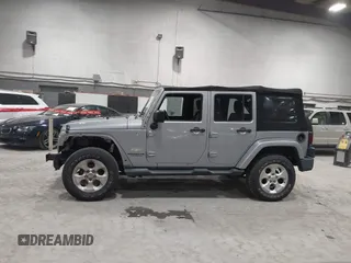 2014 Jeep Wrangler Unlimited Sahara with VIN 1C4BJWEG5EL164350, listed as a IAAI auction lot 42018586 with 113,222 mi miles. Bid and sale history available at carsss.com. Image 15.