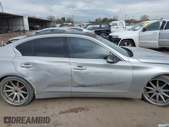 2014 Infiniti Q50 with VIN JN1BV7AP0EM681679, listed as a IAAI auction lot 41371773 with 141,940 mi miles. Bid and sale history available at carsss.com. Image 13.