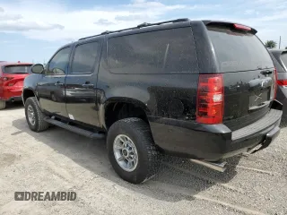 2013 Chevrolet Suburban with VIN 1GNWKMEG4DR257785, listed as a Copart auction lot 76817344 with 68,021 mi miles and Salvage title. Bid and sale history available at DreamBid. Image 2.