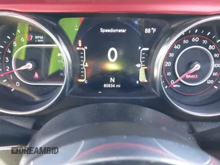 2021 Jeep Wrangler Unlimited Rubicon with VIN 1C4HJXFGXMW850556, listed as a IAAI auction lot 42234282 with 80,834 mi miles and . Bid and sale history available at DreamBid. Image 7.