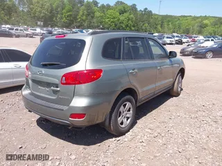 2009 Hyundai Santa Fe GLS with VIN 5NMSG13D19H331269, listed as a IAAI auction lot 42005021 with 120,215 mi miles. Bid and sale history available at carsss.com. Image 4.