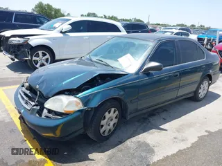 1998 Honda Civic LX z VIN 1HGEJ6671WL011642, wystawiony jako IAAI lot #42308904 z przebiegiem 77 380 mil mil oraz . Historia ofert i sprzedaży dostępna na DreamBid. Obrazek 2.