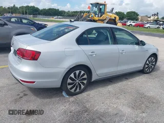 2013 Volkswagen Jetta Hybrid SEL with VIN 3VW637AJ2DM233265, listed as a IAAI auction lot 42746158 with 105,779 mi miles and . Bid and sale history available at DreamBid. Image 4.