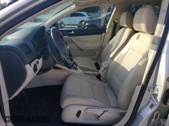 2010 Volkswagen Jetta SE with VIN 3VWRX7AJ1AM048637, listed as a Copart auction lot 57045965 with 158,297 mi miles and Salvage title. Bid and sale history available at DreamBid. Image 7.