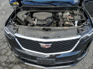 2023 Cadillac XT6 FWD Premium Luxury with VIN 1GYKPCRS5PZ220616, listed as a Copart auction lot 56913725 with 25,860 mi miles and Salvage title. Bid and sale history available at DreamBid. Image 12.