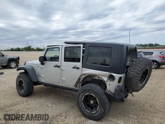 2011 Jeep Wrangler Unlimited Rubicon with VIN 1J4BA6H13BL537964, listed as a Copart auction lot 57532725 with 71,498 mi miles and Salvage title. Bid and sale history available at DreamBid. Image 2.