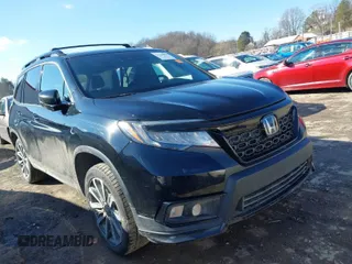 2019 Honda Passport Elite with VIN 5FNYF8H07KB014647, listed as a IAAI auction lot 41544464 with 82,698 mi miles. Bid and sale history available at carsss.com. Image 1.