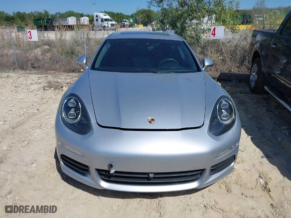 2014 Porsche Panamera S E-Hybrid with VIN WP0AD2A75EL044663, listed as a IAAI auction lot 41818381 with 44,194 mi miles. Bid and sale history available at carsss.com. Image 12.