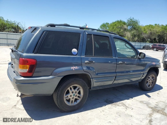 2004 Jeep Grand Cherokee Laredo with VIN 1J4GX48N54C371073, listed as a Copart auction lot 52202855 with 212,368 mi miles and Salvage Title. Bid and sale history available at carsss.com. Image 3.