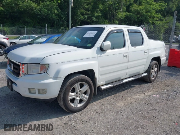 2010 Honda Ridgeline RTL with VIN 5FPYK1F58AB012526, listed as a IAAI auction lot 42421618 with 258,727 mi miles and . Bid and sale history available at DreamBid. Image 17.