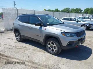 2022 Jeep Compass Trailhawk with VIN 3C4NJDDB4NT223156, listed as a IAAI auction lot 42510662 with 61,895 mi miles and . Bid and sale history available at DreamBid. Image 1.