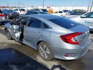 2020 Honda Civic LX with VIN 2HGFC2F6XLH533726, listed as a IAAI auction lot 41633882 with 141,835 mi miles and . Bid and sale history available at DreamBid. Image 3.