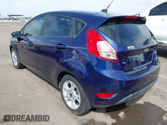 2016 Ford Fiesta SE with VIN 3FADP4EJ4GM199945, listed as a IAAI auction lot 41881260 with 98,945 mi miles. Bid and sale history available at carsss.com. Image 3.