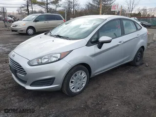 2015 Ford Fiesta S with VIN 3FADP4AJ5FM125857, listed as a IAAI auction lot 41704494 with 73,151 mi miles. Bid and sale history available at carsss.com. Image 2.
