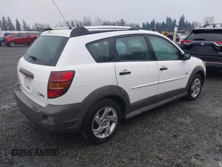 2007 Pontiac Vibe with VIN 5Y2SL65857Z420084, listed as a IAAI auction lot 41070118 with 168,243 mi miles. Bid and sale history available at carsss.com. Image 4.