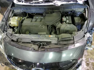 2015 Mazda CX-9 Sport с VIN JM3TB2BA0F0465449, выставлен на аукционе Copart как лот 45874045 с пробегом 136 553 миль миль и Списание • Salvage title. История ставок и продаж доступна на DreamBid. Изображение 13.